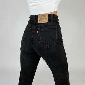 Vintage, made in USA, orange tab black Levi 550 jeans!